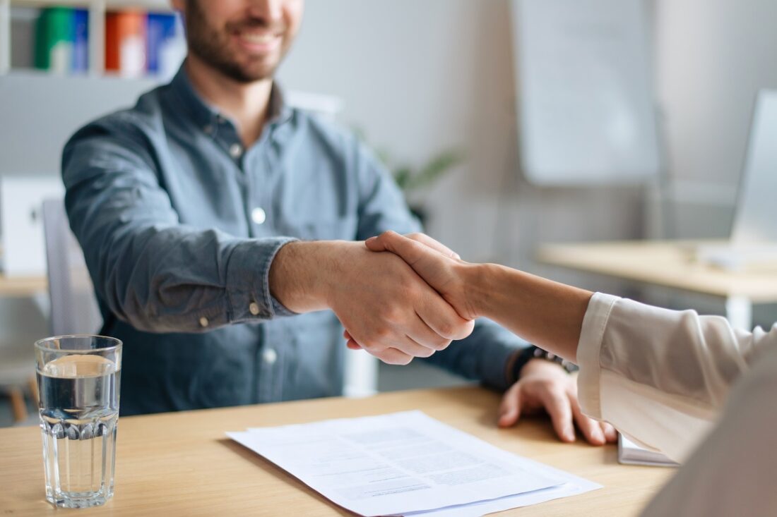 Cropped,View,Of,Human,Resources,Manager,Shaking,Hands,With,Successful