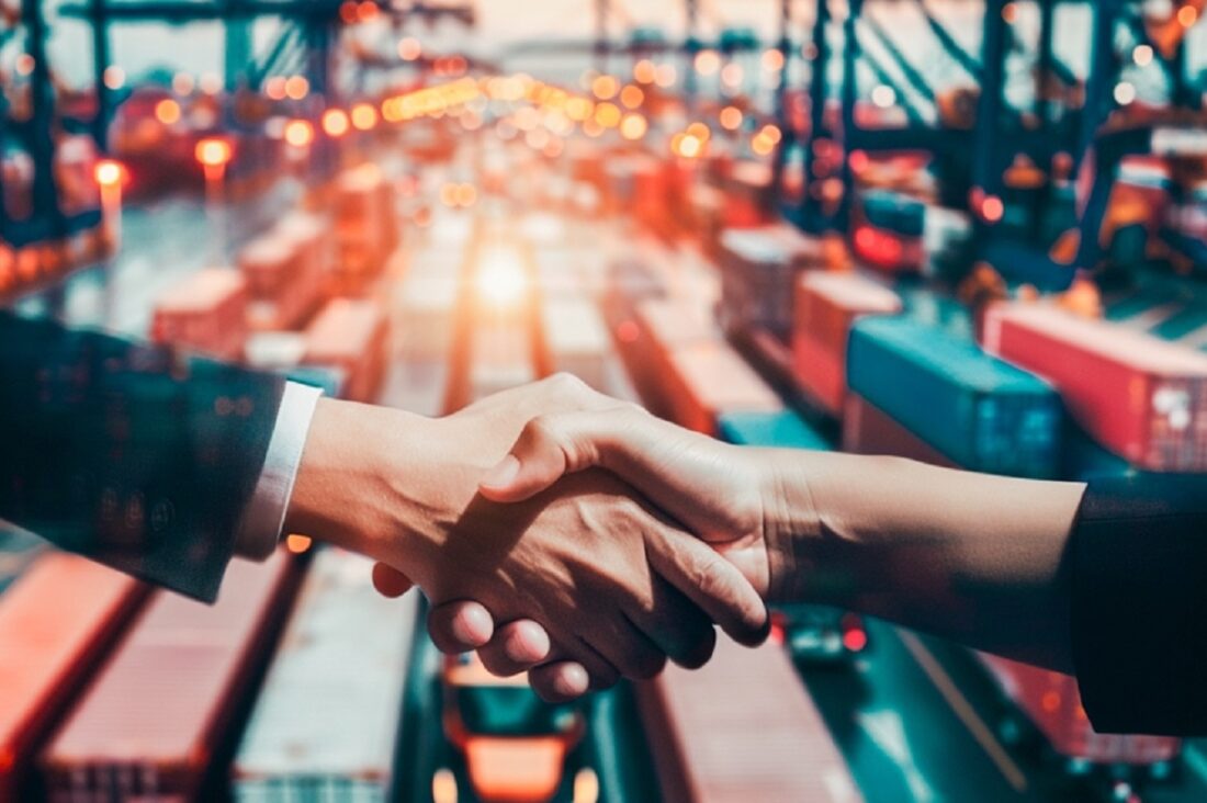 Business,Collaboration,,Businessman,Shake,Hands,With,3d,Global,And,Blur