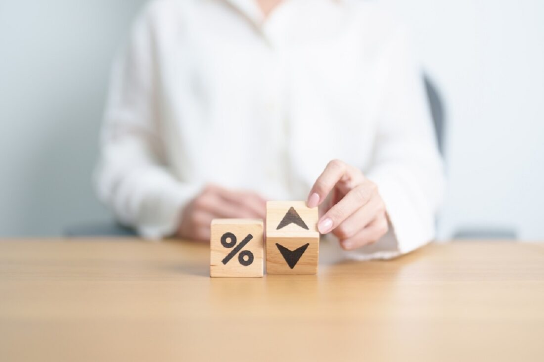 Wood,Block,Of,Percentage,Change,To,Up,And,Down,Arrow.