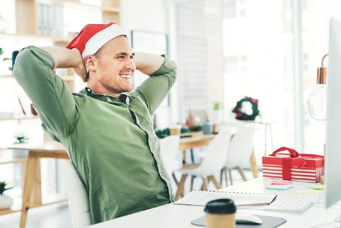 Happy,Businessman,,Relax,And,Office,With,Christmas,Hat,For,December