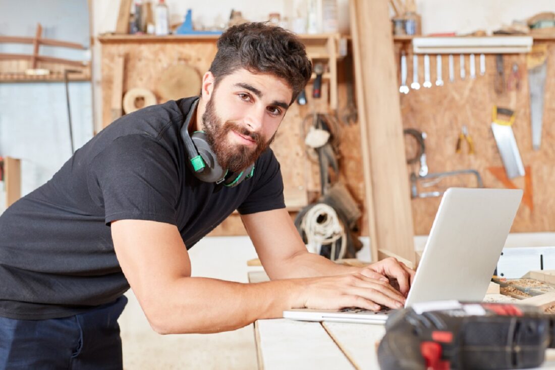 Young,Craftsman,Writes,An,Email,As,Customer,Service,On,The