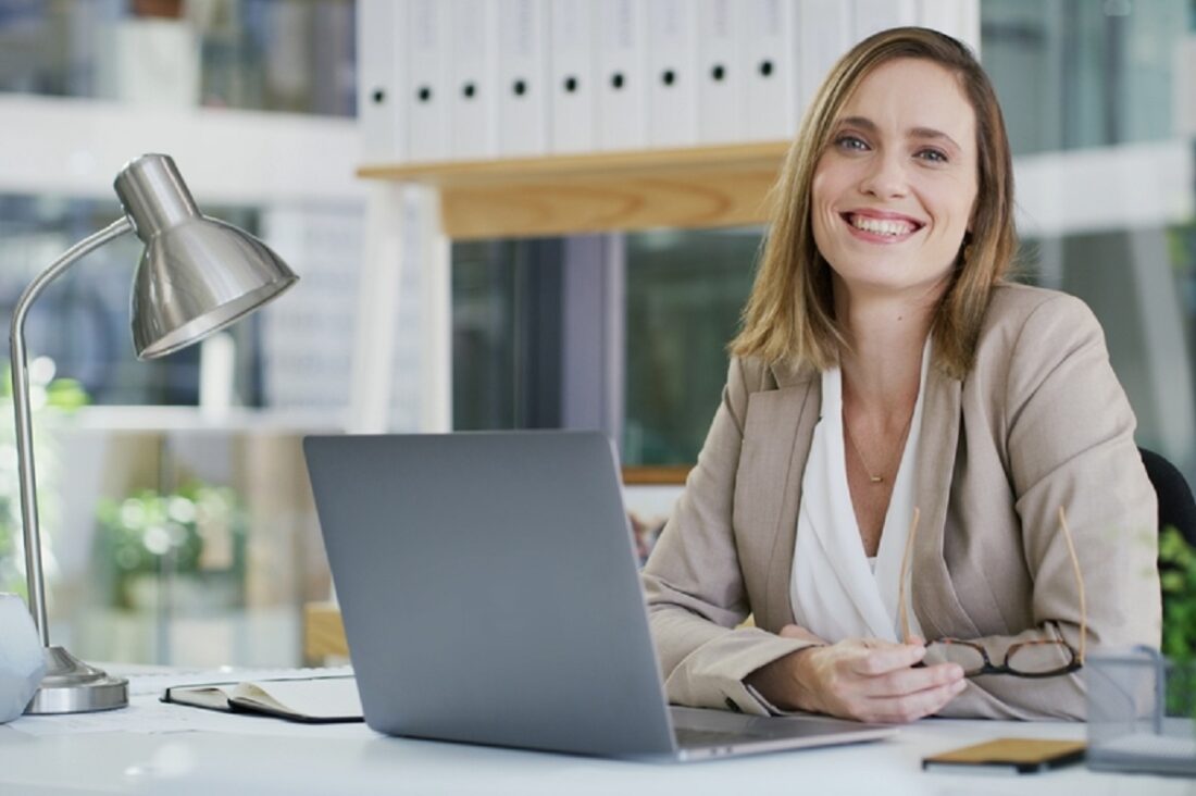 Business,,Laptop,And,Portrait,With,Accountant,Woman,At,Desk,In