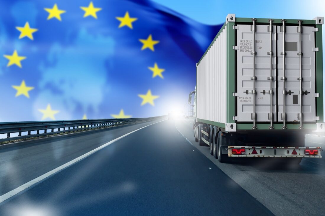 Cargo,Transportation,By,Road,In,Eu.,Truck,With,Flag,Of