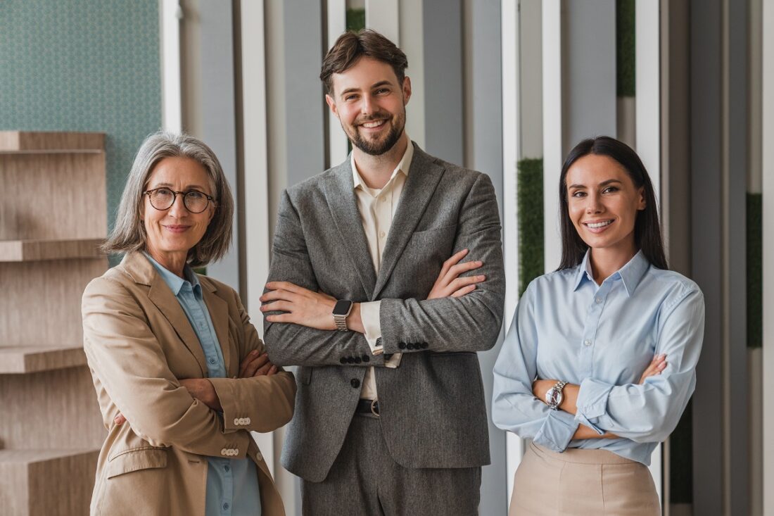 Portrait,Of,Smiling,Caucasian,Business,Man,And,Business,Women,Standing
