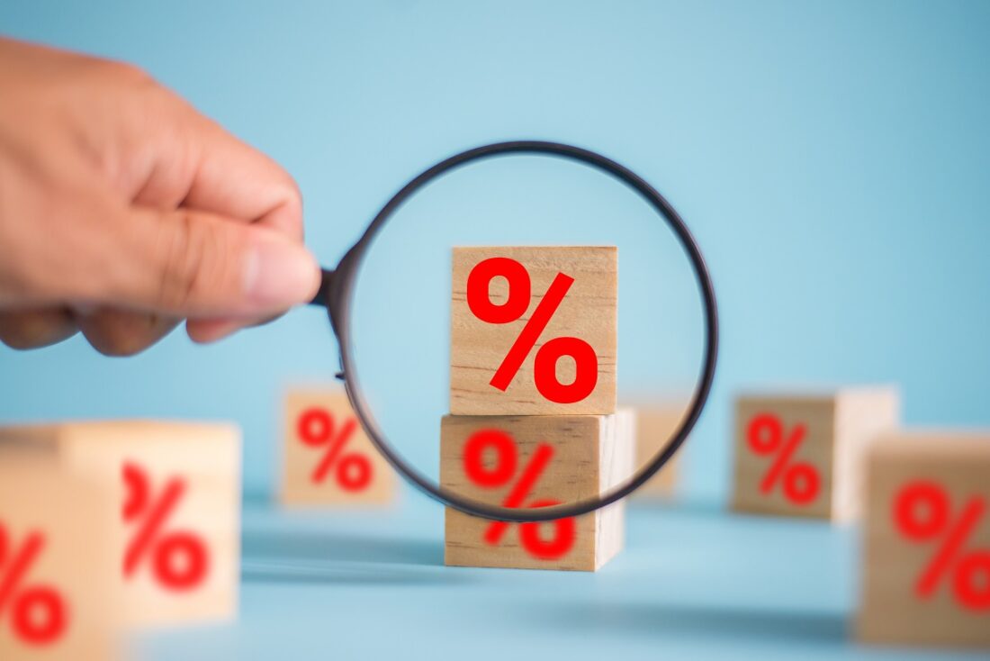 Interest,Rate,Financial,And,Mortgage,Rates,Concept.,In,The,Hand